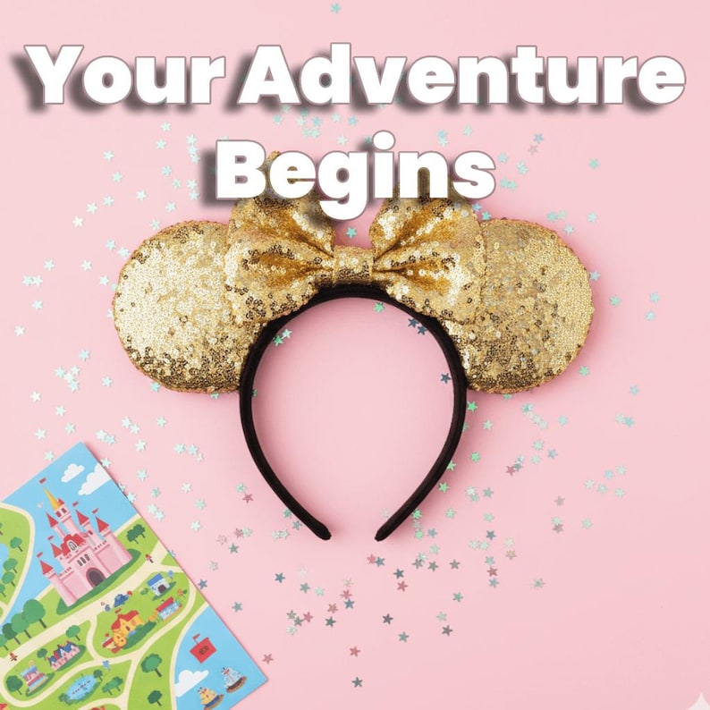 May include: A gold sequined mouse ear headband with a black band, and a matching bow. The text "Your Adventure Begins" is displayed above the headband on a pink background, along with a colorful map.