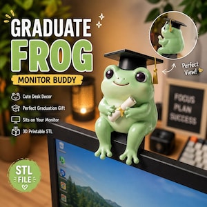 Könnte beinhalten: Hellgrüne Froschfigur mit schwarzer Abschlusskappe und Schriftrolle. Der Frosch ist als Monitor-Buddy konzipiert und soll am Rand eines Computerbildschirms platziert werden. Das Bild enthält den Text "Graduate Frog Monitor Buddy".