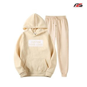 May include: A beige hoodie and matching sweatpants set. The hoodie features a front pocket and a hood with a drawstring. The text "CUSTOM YOUR LOGO" is printed on the front of the hoodie. The sweatpants have a drawstring waist.