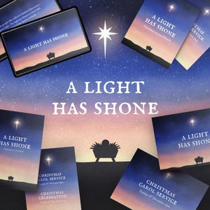 May include: A collection of Christmas-themed cards and a tablet featuring the text "A LIGHT HAS SHONE". The cards have a night sky background with a star and a silhouette of a manger. The text "Christmas Carol Service" is also visible.