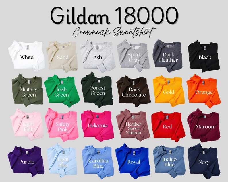 Puede incluir: Una selecci&oacute;n de sudaderas Gildan 18000 con cuello redondo en varios colores, incluyendo blanco, negro y azul marino. La imagen muestra una gama de tonos, como verde, rosa y azul, con cada sudadera etiquetada con su nombre de color. El texto "Gildan 18000 Crewneck Sweatshirt" est&aacute; en la parte superior.