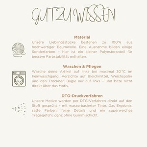May include: A cream-colored informational graphic with the text "GUT ZU WISSEN" at the top. The graphic details material composition, washing instructions, and DTG printing methods, using icons of yarn, a washing machine, and a spray nozzle.