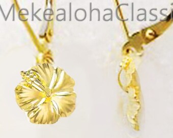 May include: Gold hibiscus flower dangle earrings with a leverback closure. ETSY MekealohaClassic.