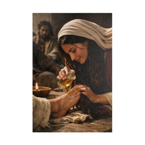 May include: A textured print depicting a person with long dark hair wearing a beige head covering, pouring golden oil from a small glass vessel onto a foot. In the background, a blurred figure sits near a small lit candle in a bowl.