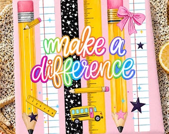 May include: A square canvas print with a pink background featuring two yellow pencils, a yellow ruler, a black and white star pattern, and lined paper strips. The text "make a difference" is centered in colorful script with a school bus and pink bow.