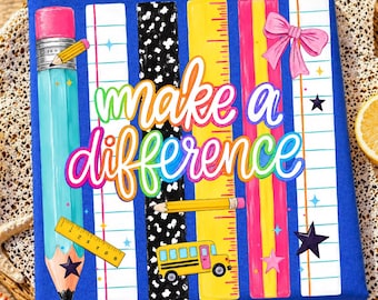 May include: A square blue sign featuring the text make a difference in colorful gradient lettering. The design includes illustrations of a large pencil, a yellow ruler, a school bus, a pink bow, and lined paper patterns with small stars.