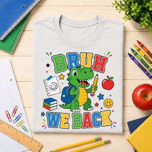 First day of school shirt mockup featuring cute cartoon dinosaur and Bruh We Back design for elementary school students