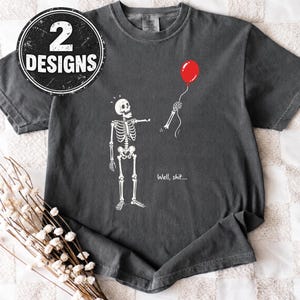 Dark grey shirt mockup with Skeleton Lost Balloon PNG SVG, funny skeleton quote and red balloon spooky Halloween artwork.