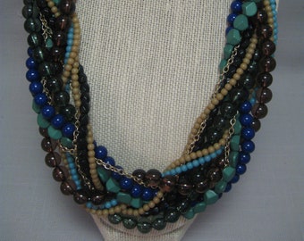 Necklace Torsade Multi 10 Strands Multi Size Beads of Green Black Beige Clear Brown Blue Turquoise Tones Gold Tone Chains Sign CN