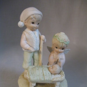 Bisque Porcelain Figurine Nativity Scene Shepherd Angel Baby Jesus Music Box Ave Maria Christopher Collection TWL 00177 Geo Z Lefton 1982