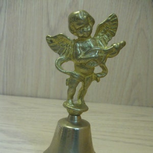 Brass Bell Figurine Angel Cherub Cupid Playing the Mandolin Gold Tone Rib Circular Line On the Bell Base 1980