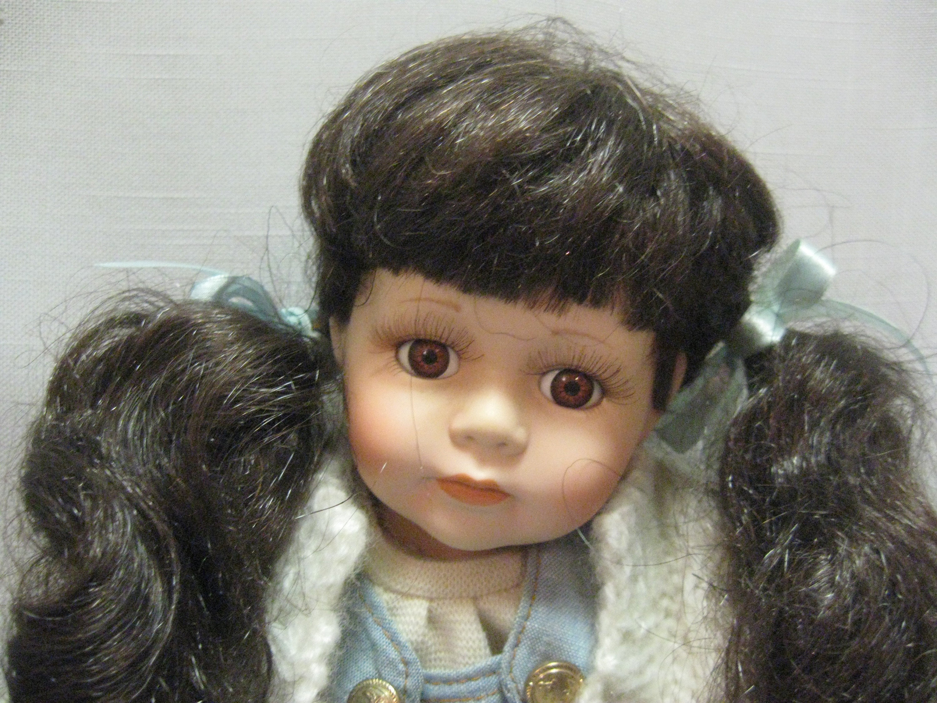 Porcelain Doll Brown Hair and Eyes Blue Overalls and Gold Tone
