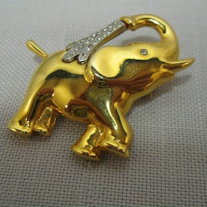 Brooch Pin Jungle Animal Figural Elephant Shiny Gold Tone Metal Crystal Clear Rhinestones On Trunk and Eye Roll Over Clasp No Mark 1990
