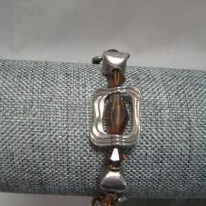 Bracelet Silver Tone Frames With Center Tan Beads Silver Tone Spacers And Toggle Clasp