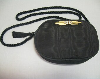 Evening Bag Black Double Heart Pin Gold Tone Crystal Clear Rhinestones Black Rope Style Material Strap Zip Closure Black Tassel Monet