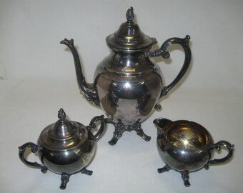 Silver Plate  4 Piece Tea Pot Creamer Sugar Bowl Lid 4 Footed Eagle Wm Rogers Star 1938-1976