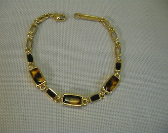 Armband Gold ton Tier Print und schwarze Links, offene Links HummerVerschluss Napier Schmuck Co