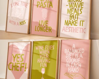 May include: Six framed art prints with humorous quotes in various colors. The prints include phrases like "I like mine with a kiss," "Eat pasta, live longer," and "Yes chef!" The frames are a light brown color.