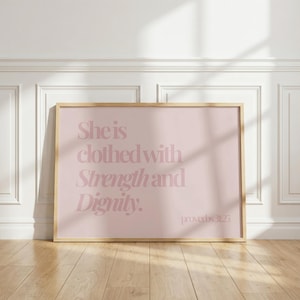 Ela se reveste de força e dignidade - Quadro com Provérbios 31:25 - Presente cristão rosa para ela - Download digital horizontal
