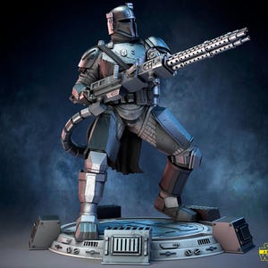 May include: A detailed 3D model of a Mandalorian warrior in full armor, holding a large, multi-barreled weapon. The figure is predominantly silver and gray, with black accents. The model is posed on a circular platform with mechanical details, set against a dark blue background.