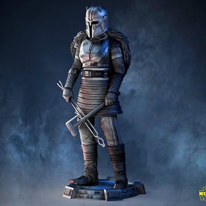 May include: A detailed 3D model of a Mandalorian warrior in full armor, holding two weapons. The figure is predominantly silver and black, with a helmet and chest plate. The model stands on a rectangular base with the Star Wars logo.