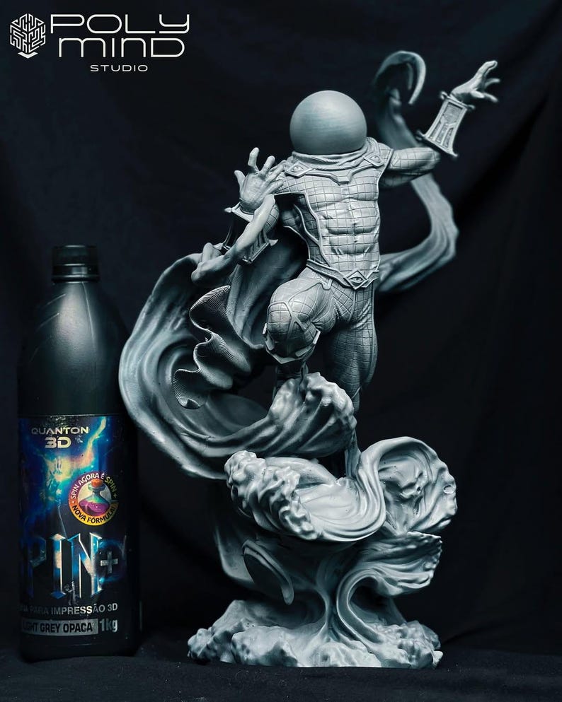 May include: A grey 3D-printed statue of a superhero with a flowing cape and detailed design. A bottle of 3D printing resin is on the left. The statue is set against a dark background. The bottle contains 1kg of resin.