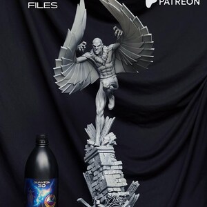May include: A gray 3D-printed figurine of a winged humanoid figure, posed dynamically atop a crumbling brick structure. The figure has outstretched wings and a menacing expression. The image includes text that says "PRE SUPPORTED FILES" and "AVAILABLE ON PATREON". A black bottle is in the image.