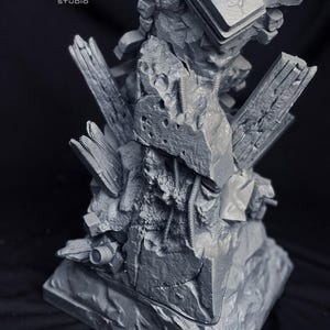 May include: A gray, detailed sculpture of a rocky, fragmented structure with architectural elements. The sculpture features the "POLY MIND STUDIO" logo in the upper left corner. The overall design suggests a post-apocalyptic or fantasy theme.