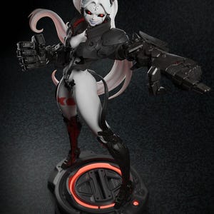 May include: A detailed figurine of a female character with white hair and red eyes, wearing a black and white outfit with futuristic armour. The figure is posed with a weapon in each hand, standing on a circular base with a glowing red ring.