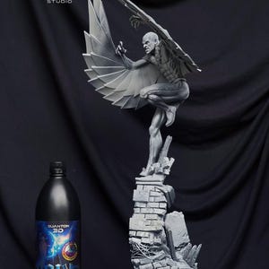May include: A grayscale sculpture of a winged figure perched atop a crumbling brick structure. The figure has detailed musculature and is in a dynamic pose. A black bottle with blue and white labels is in the foreground. The sculpture is from Poly Mind Studio.