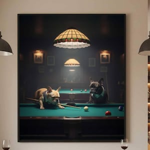 May include: A framed print depicts two French Bulldogs playing pool under warm lighting. The scene is set in a dimly lit room with a bar and stools in the foreground. A neon sign reads "Cheers".
