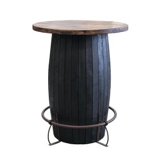 May include: A rustic bar table with a round, dark wood top and a barrel-shaped base. The base is made of black-stained wood with metal accents, including a footrest. The table is designed for indoor use.