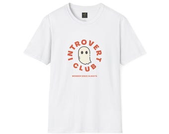 May include: White t-shirt with a round graphic that reads "Introvert Club" in red letters. A cartoon ghost is in the center of the graphic. The text "Member Since Always" is below the graphic.