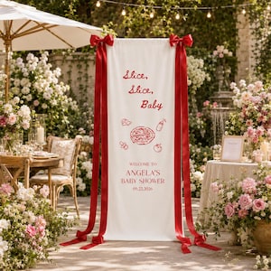 May include: A tall white vertical banner featuring red text that reads Slice, Slice, Baby, Welcome to Angela's Baby Shower, and 09.22.2026. The banner includes red line drawings of a pizza, a baby bottle, a pacifier, and a tomato, with red ribbons.