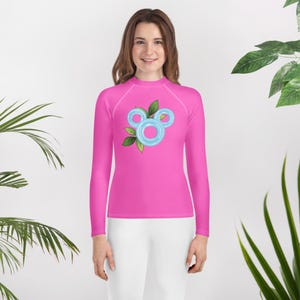 Pool Party Pop Youth Rash Guard – Bright Pink & Blue Float Ring Print – Kids Swimwear for Pool, Beach, and Summer Vacations