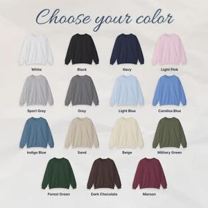 May include: A selection of crewneck sweatshirts in various colors, including white, black, navy, and light pink. The image displays the available colors with labels such as "Sport Grey", "Indigo Blue", and "Maroon". The text "Choose your color" is at the top.
