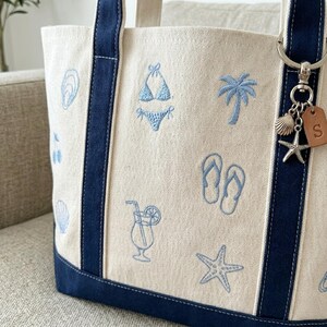Whether you’re heading to the shoreline for a "Coastal Grandma" summer or packing for a peaceful picnic by the lake, our Personalized Embroidered Boat Tote is your new favorite companion. Crafted from premium, heavyweight cotton canvas, this isn't just a bag—it's a high-quality keepsake designed to carry your essentials in style.