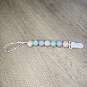 Dainty pacifier clip