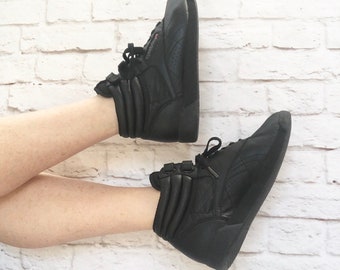 reebok black high top sneakers