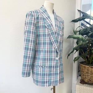 May include: A set of three ceramic mugs with a speckled, matte finish. The mugs are in shades of cream, light gray, and dark gray. Each mug has a simple, minimalist design, perfect for coffee or tea.