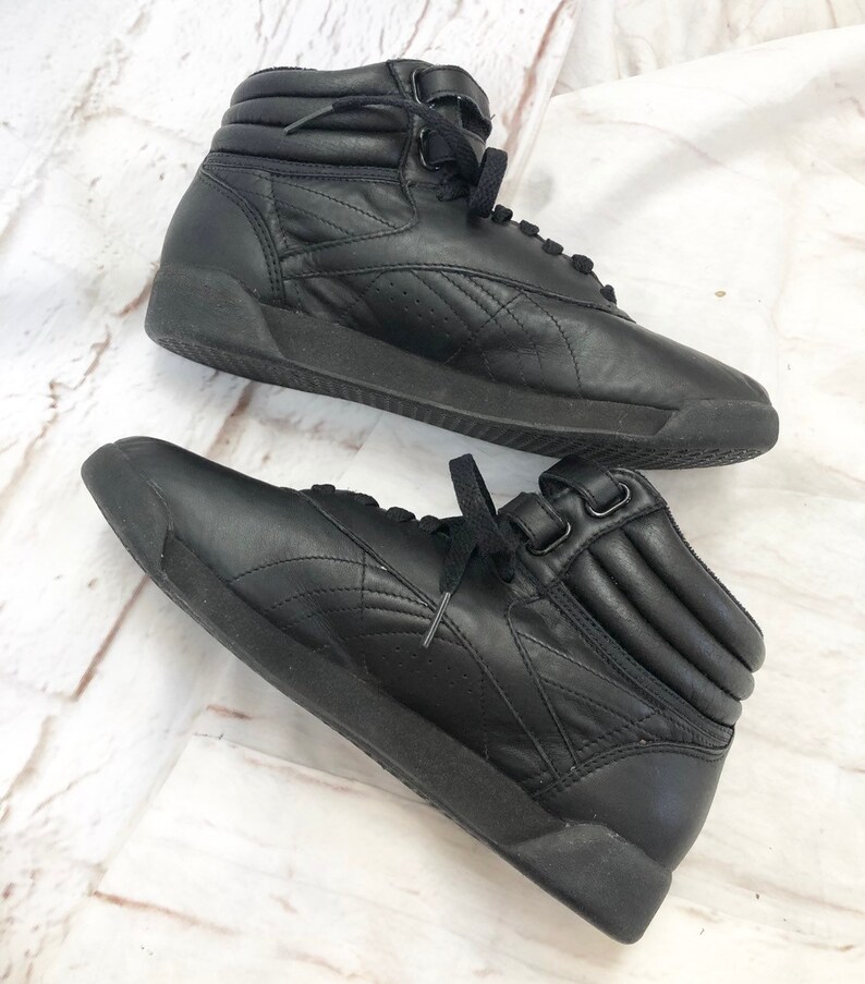 reebok high tops with straps