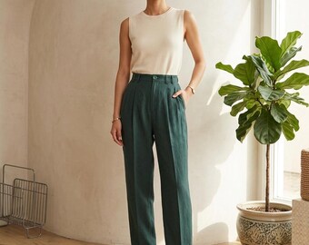 Pantaloni vintage anni '80 verdi a vita alta, taglia M, con tasche, pieghe, in seta e rayon.