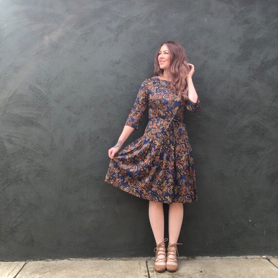 green emerald velvet dress Matilda Dress Drop Shoulder Belted Printed Midi Dress main image 0