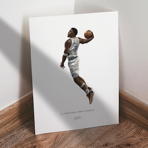 May include: A print of a basketball player in mid-air, holding a basketball. The player is wearing a white and gray uniform with the number 5. The print includes the text "Anthony Edwards // Minnesota Timberwolves".
