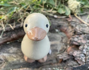 Brown Concrete Desk Goose