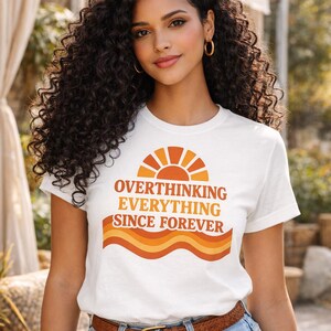 Woman wearing funny overthinking graphic shirt styled with denim outfit casual unisex t shirt