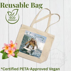 May include: A white ceramic mug with a black handle and the text "But First, Coffee" in a bold, black font. The mug is set against a blurred background, suggesting a cozy setting. The mug appears to be approximately 4 inches tall.