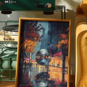 May include: A framed art print showing a rainy city street scene with a reflective orb. The artwork uses vibrant colours, including orange, blue, and red, with reflections on the wet pavement. The print is displayed near a green record player.