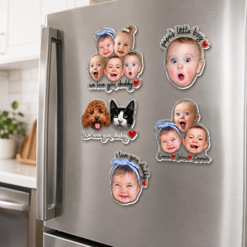 May include: Five custom acrylic photo magnets featuring portraits of children and pets. The magnets display text including 'We love you, daddy', 'papa's little boy', and 'i love you daddy', accompanied by red heart icons and names like Emma, John, and Casxon.