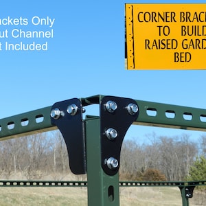 May include: Close-up of a corner bracket for building a raised garden bed. The bracket is made of black metal and has four holes for attaching to the strut channel. The bracket is attached to a green metal strut channel. The text on the sign reads "Corner Brackets to Build Raised Garden Bed".
